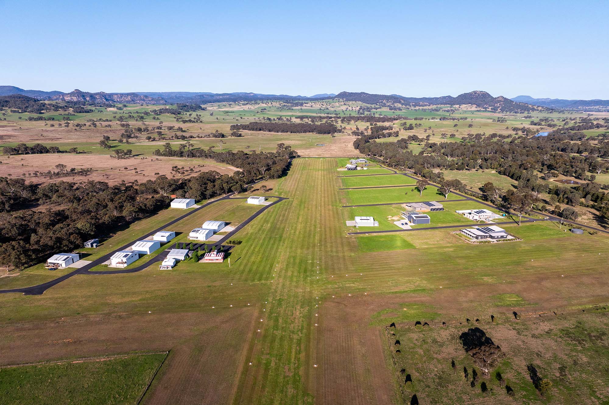 plane runway grass country